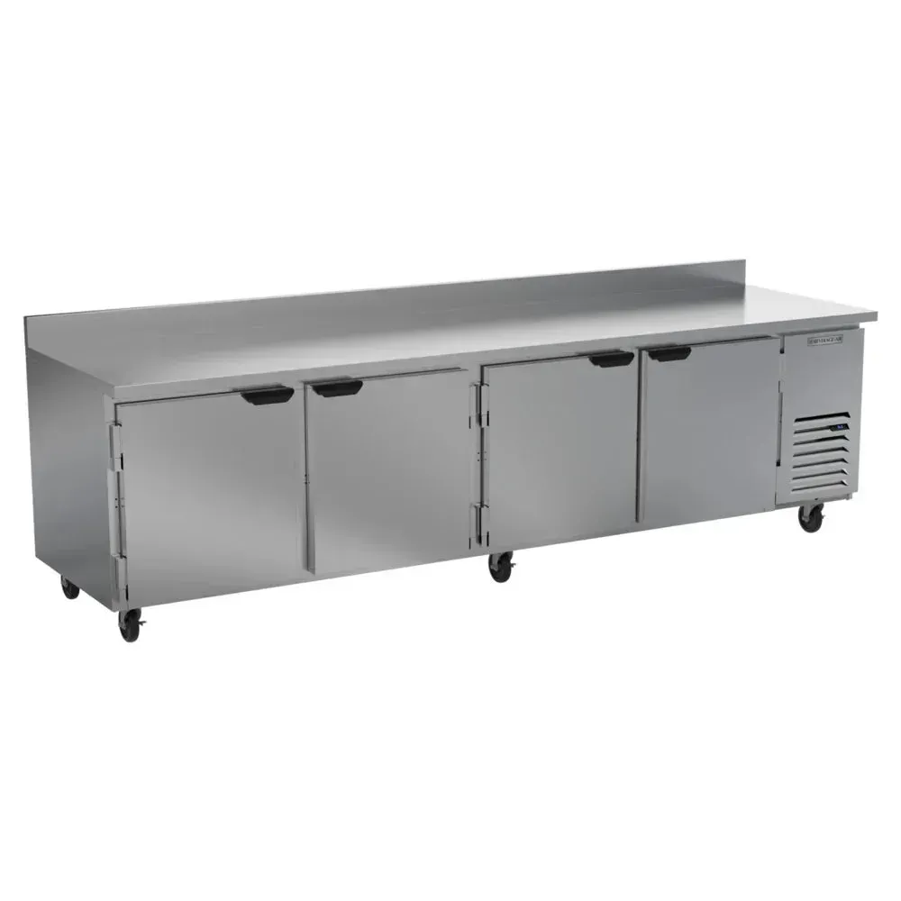 Stainless steel worktop refrigerator with backsplash keeps ingredients fresh for prep; Beverage-Air chef base supports hotels, cafes, and restaurants.