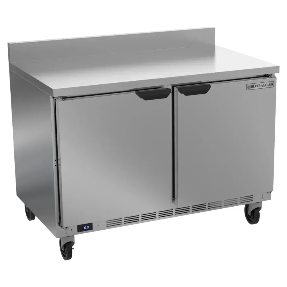 Two-door worktop refrigerator with stainless steel backsplash from Beverage-Air, designed for restaurant prep, hotel bars, or cafe sandwich lines.
