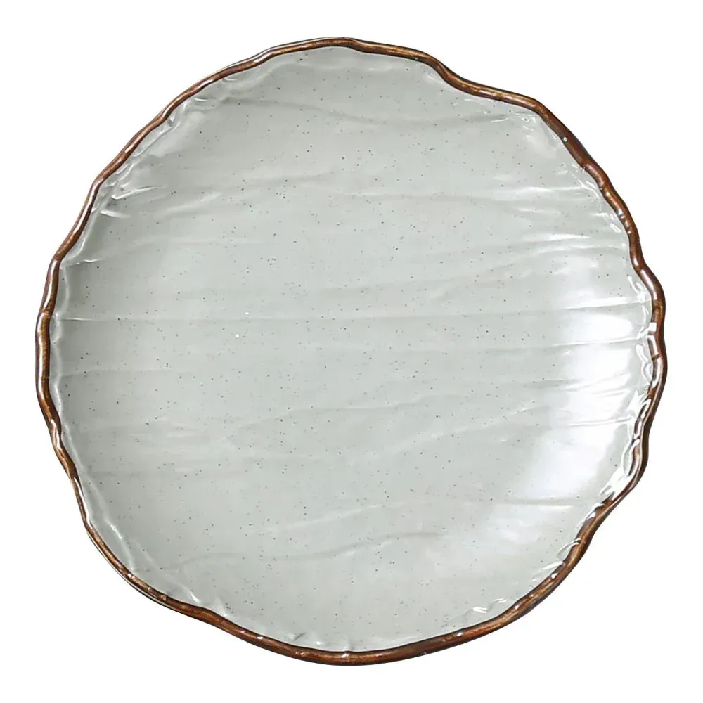 Yanco China small green melamine round coupe plate with matte finish, perfect for desserts or single portions in any style of dining setting.