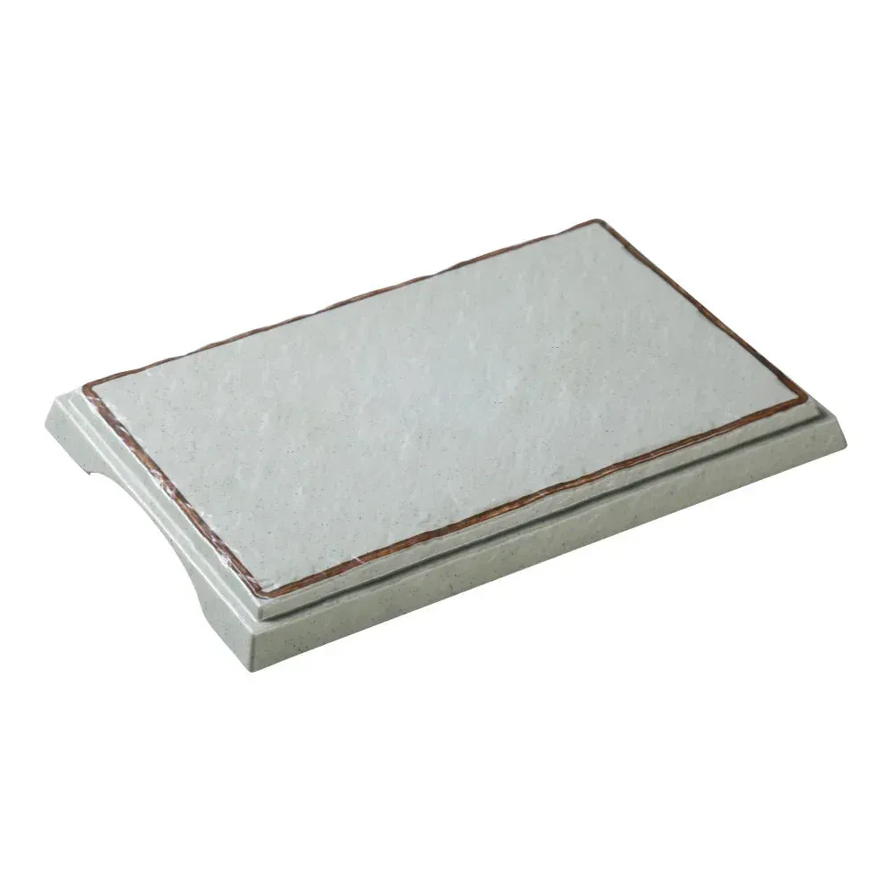 Yanco China green melamine rectangular display plate with foot, ideal for showcasing dishes beautifully in buffets, dining, or special events.