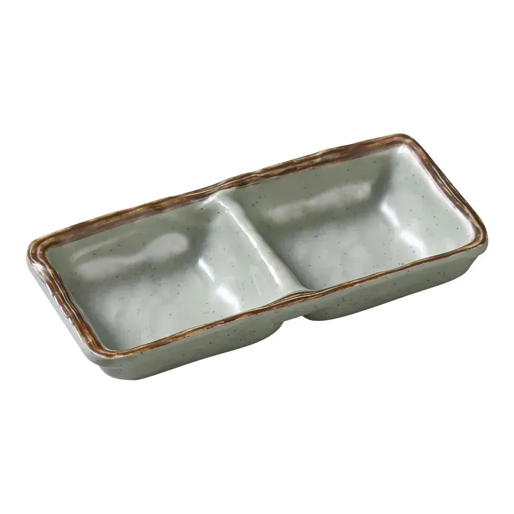 Yanco China green melamine double sauce dish with matte finish, perfect for serving dips, sauces, or condiments in dining or catering.