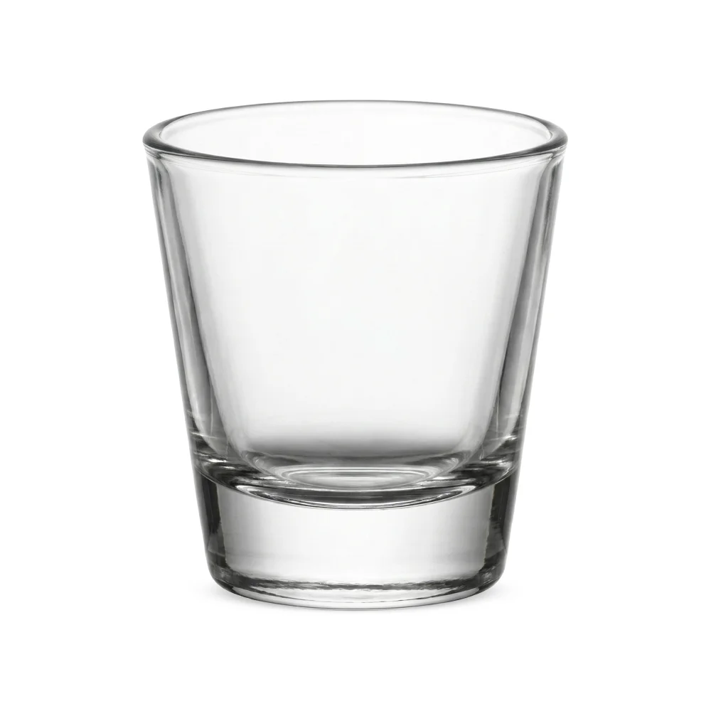 Round shot glass by Libbey with a weighted base that offers stability and classic style for efficient bar service in high volume use.