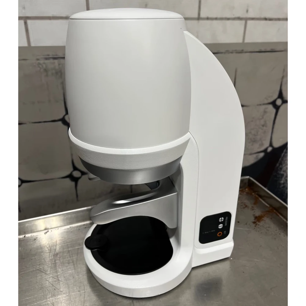 Used Nuova Simonelli PuqPess Q6 Gen 6 Automatic Coffee Tamper - 110V, 58 mm Tamper Diameter, White