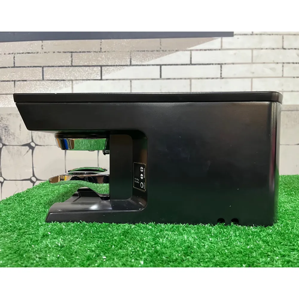 Used Nuova Simonelli PuqPress M2 Gen 5 Automatic Tamper for Mythos & Mythos II Grinders - 110V, 58 mm Tamper Diameter, Black