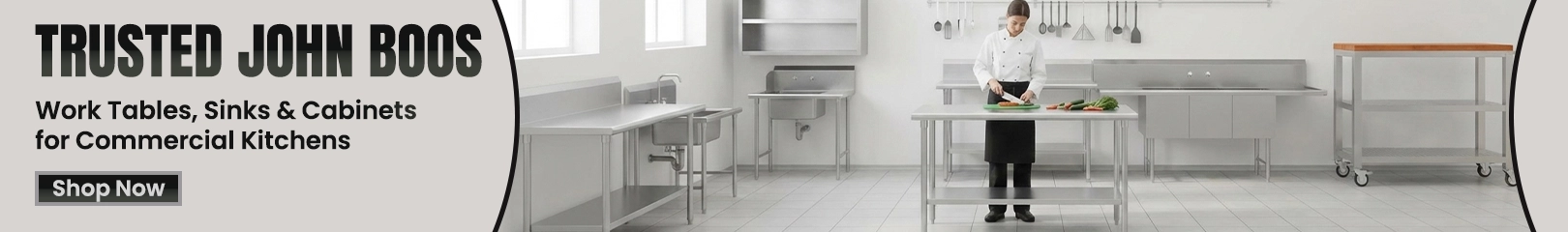 John Boos stainless steel work tables, sinks, and cabinets used in a professional commercial kitchen setup.