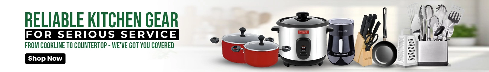 Reliable kitchen gear including red cookware pots, electric rice cooker, mixer grinder, knife set, frying pan, and stainless-steel utensils on countertop