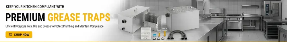 Commercial grease traps with fittings and accessories displayed in a professional kitchen for efficient grease management
